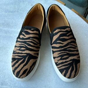 Ugg woman’s tiger print slip on shoe size 10